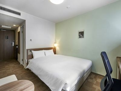 スタンダードダブルルーム(本館)(喫煙) ダイワロイネットホテル沖縄県庁前の写真