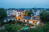 Hua Zhu · Quzhou Puli Flower Craftsman's Home Inn (Future Community Wetland Park Store) Hotels in Quzhou