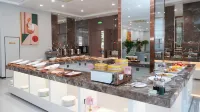 Dalian Xinchen Business Hotel - Morgenmad