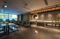 Ni Hao Hotel (Jinzhou Wanda Plaza Bohai University) - พร้อมWifi