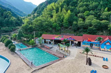 Niujiao Resort Отели рядом с достопримечательностью «Huangjiali Ancient Trees»