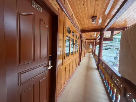 Zangmi Mountain Villa Отели рядом с достопримечательностью «Baimazhai Village»