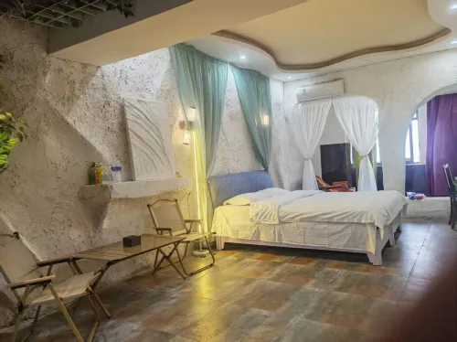 Gangzi Homestay (Baolong City Plaza)