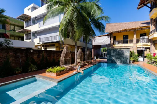 Motive Cottage Resort Отели рядом с достопримечательностью «Small Sandy Beach»