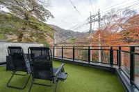 River view house with BBQ & private sauna, wood stove — designer villa with stone terrace & fire