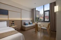 Qianna Hotel Glorious (Anyang East High-speed Railway Station Wanda Plaza Branch)