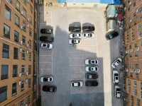 Daming Longjing Business Hotel - parking