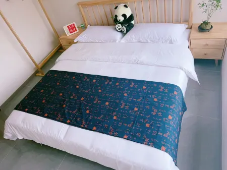 Xixi City Homestay (Guanghan Samsungdui Branch) Отели в г. Гуанхан
