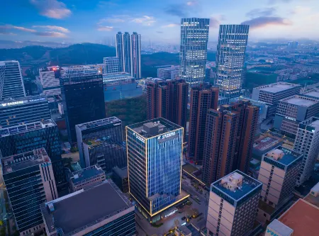 Shenzhen Zhongchen International Hotel (Baolong Subway Station Pingshan high-speed railway station) Отели рядом с достопримечательностью «Baoneng All City Shopping Center Longgang Branch (Jianshe Road)»