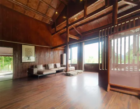 Jiuhuang Xinyi Homestay Отели рядом с достопримечательностью «Ape Cavern in Jiuhuang Mountain»