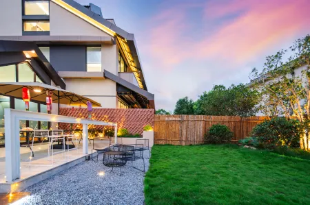 JIU JIE MIN SU Отели рядом с достопримечательностью «Shanghai Wild Animal Park»