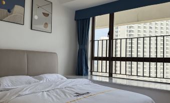 Easley Hotel Apartments(Wuchuan Dinglong Bay store)