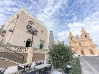 Doms Boutique Living Hotels near Ramla Bay