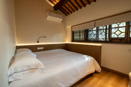 Yanguan Chaolezhicheng Keci Chinese Inn Отели рядом с достопримечательностью «Xiaoputuochan Temple»