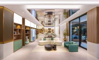 Magnolia Business Hotel ( Dalian Jinzhou Hengda Garden)