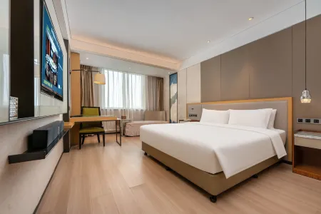 Zibo Taixing Hotel (Railway Station Badaju Branch) Отели в г. Цзыбо