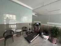 Tuke Shanglin Hotel - gimnasio