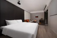 Xihuan S Hotel<Huangmei Pengtai Hotel>