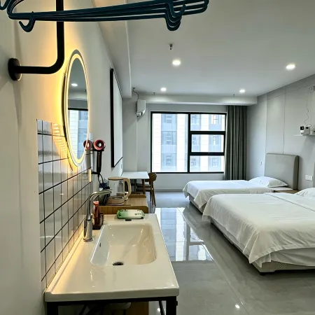 Xipai Orange Sleep Apartment (Changchun Yuanda Shopping Center)