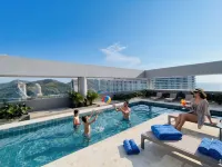 Infinity Pools · Premium Resort · Rooftop - Mountain view