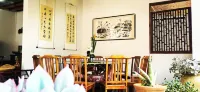 Puzhehei Riverside Inn - servizio colazione