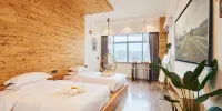 Hema Internet Homestay (Nanning MIXC Store) - Houten Chakra-max Projectie Tweelingzaal