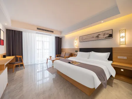 Shanhe Puyin Hotel (Xinyang East high speed railway station store) Отели рядом со станцией Xinyang East Railway Station