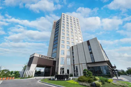 Pushi Hotel（Suzhou High-speed Railway North Station） Отели рядом с достопримечательностью «Yangcheng Lake Lotus Island»