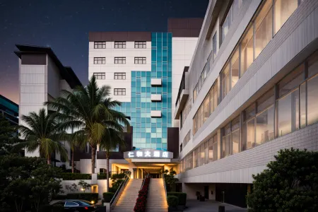 Renhe Hotel (Panzhihua Renhe Square High-speed Railway Station) Отели рядом с достопримечательностью «Datian Convention Relic Site»