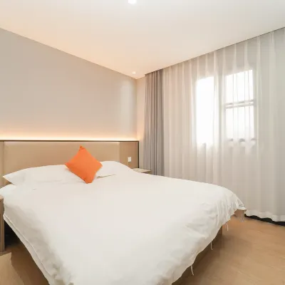 Yixin Hotel Chain ((Expogarden at Dezhou Road) Hoteles cerca de Estación de Longde Road