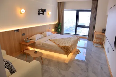 cheng Jing min su (baolong plaza branch) Отели рядом со станцией Xinxiang East Railway Station