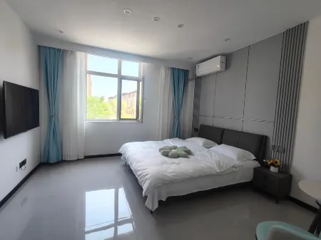 Shapai Homestay (Meihekou Northeast Nightless City Hailong Lake) Отели рядом с достопримечательностью «Meihekoushi Zhangbai Mountain Botanical Garden»