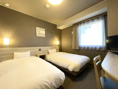 Hotel Route-Inn Yuuki Отели в г. Тикусей