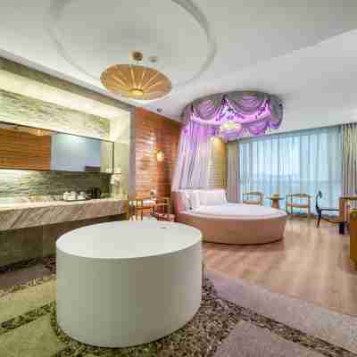 居卡曼花園酒店（靈湖景區店） Rooms