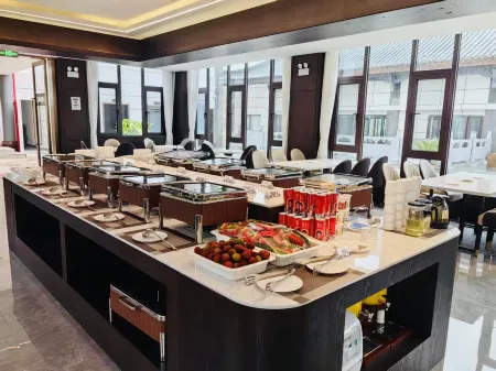 Yuehengtai Zhuang Hotel Отели рядом с достопримечательностью «Lufeng Dinosaur Fossil Site»