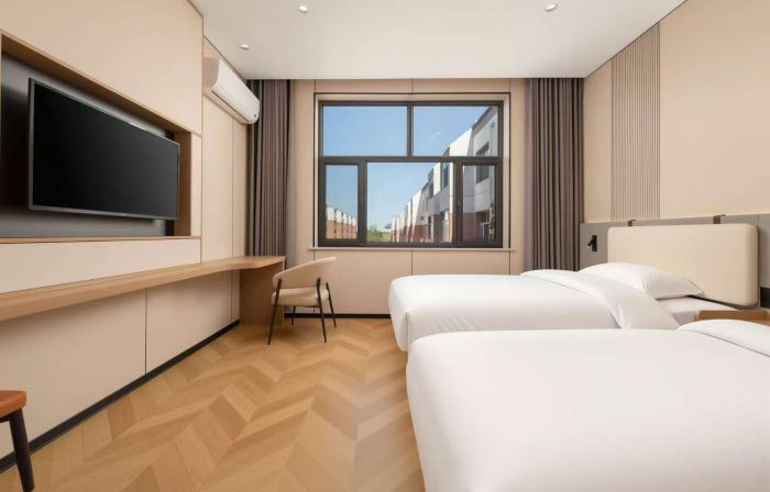 Yuehua Business Hotel, Ejina