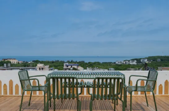Weizhou Island Xinya Juzhu B&B (Nanwan Street Shiluokou Beach Scenic Area) Отели рядом с достопримечательностью «Great Palace»