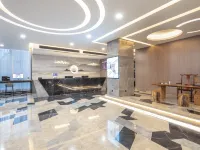 Huaju Hotel (Wenfeng World Store, Middle Jianghai Road, Qidong) Hoteles en Qidong