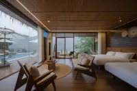 Xishuangbanna Jinghongjiang Xunjiangshe Resort Hotel