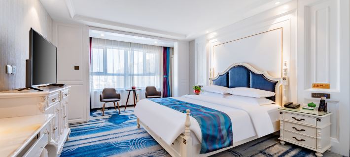 Hanyuan Business Hotel (Victoria commercial building of Linhe high speed railway station) Hotele w: Bayan Nur