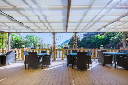 Anji Longwangxi Golf Resort Villa Отели рядом с достопримечательностью «guo ji zhu yi shang mao cheng»