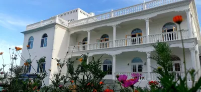 吐魯番葡鄉小築民宿（葡萄鎮店） 鄰近吐魯番圖書館的酒店