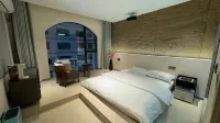 Rongjiang Xinyu Xingyuan Homestay (Village Super Football Field) - Bãi đậu xe