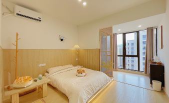 Doghouse Gowu Homestay (Minhou University Town/Shangjie Fujian Normal University Qishan Campus)