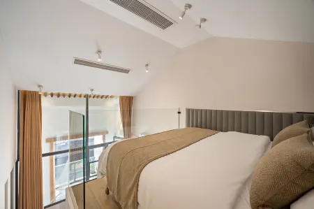 Muchen Heyin Garden Design Hotel (Shaoxing Lu Xun Hometown Cangqiao Zhijie Branch) Отели рядом с достопримечательностью «Cangqiao Street»