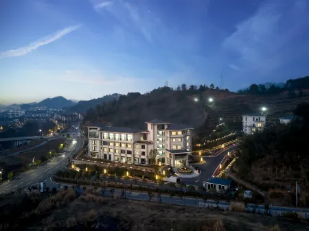 XinSu · YaYuan Resort Hotel (QianGuQing) Отели в г. Ичунь
