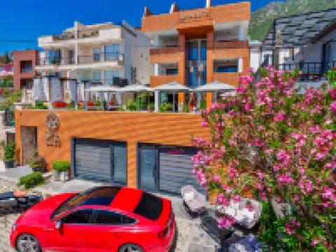 Lupia Suites โรงแรมในคาช