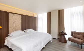 Riqi Qinghui Homestay (Qinghui Garden Huagai Road Pedestrian Street)