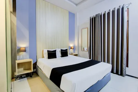 Hotel O Tegal Near Near Pacific Mall Tegal Formerly Hugo Suites Family Отели рядом с достопримечательностью «Tek Hay Kiong Temple»
