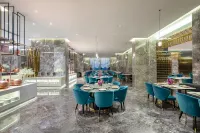 Wyndham Lijiang Yulong Hotel(Lijiang Railway Station) - فطور